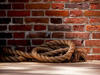 rope against old brick wall